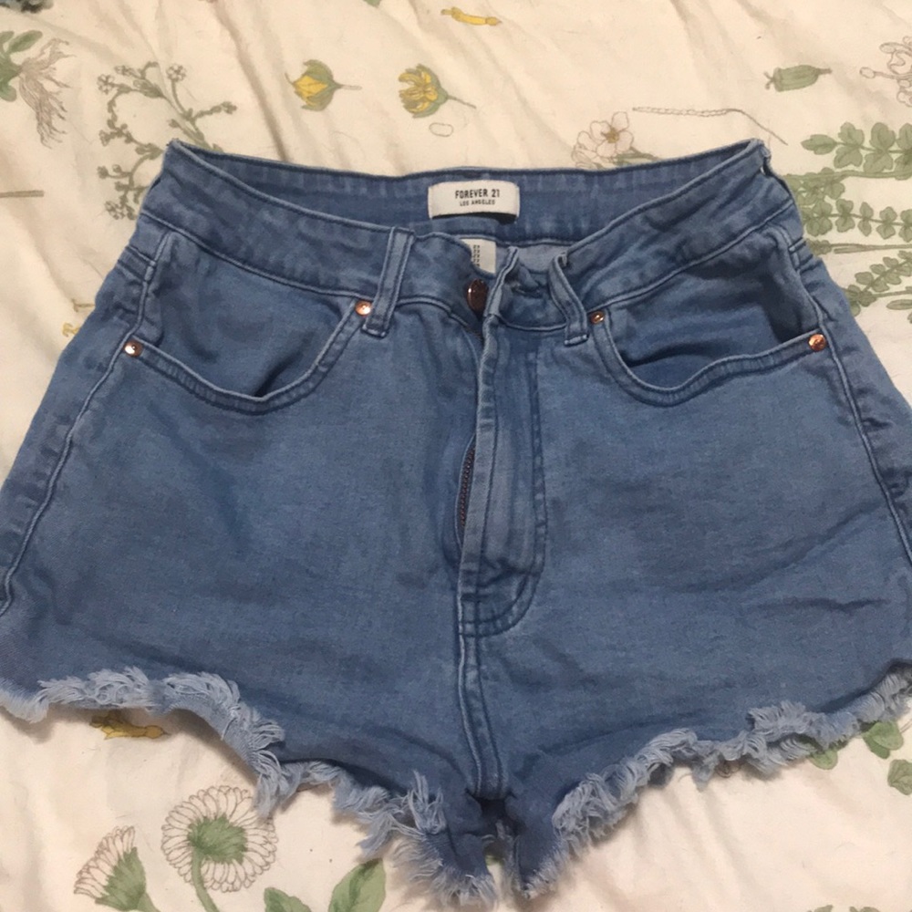 High rise fringed denim shorts